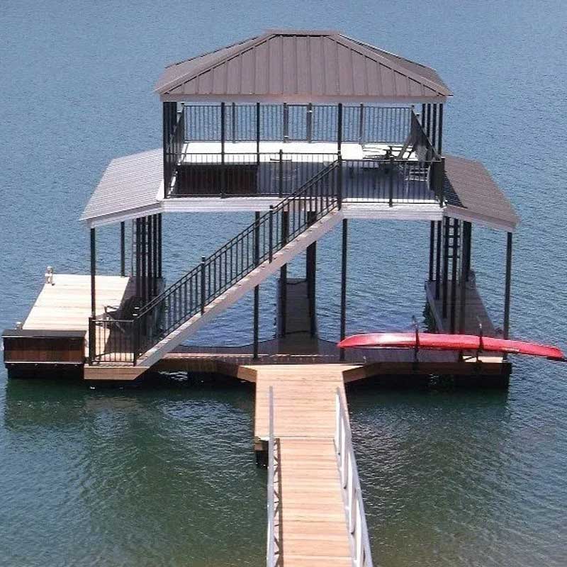Large covered dock with boat slip and kayak storage