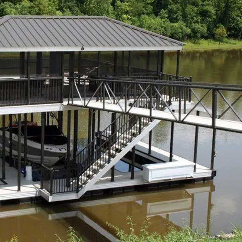 Luxury covered dock with dining space and boat parking