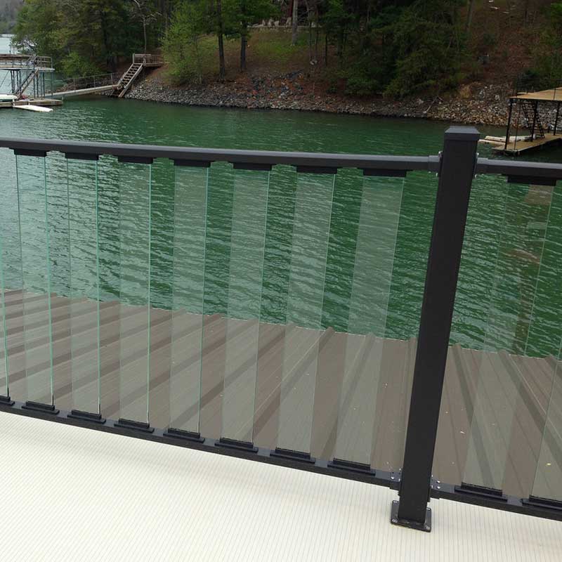 Clear railing on dock over water